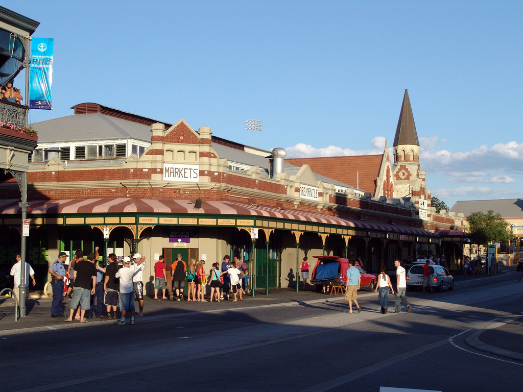 The Freemantle Markets. A large indoor market with stalls selling crafts, food, clothing, more crafts. Photo via Flickr CC matt pounsett