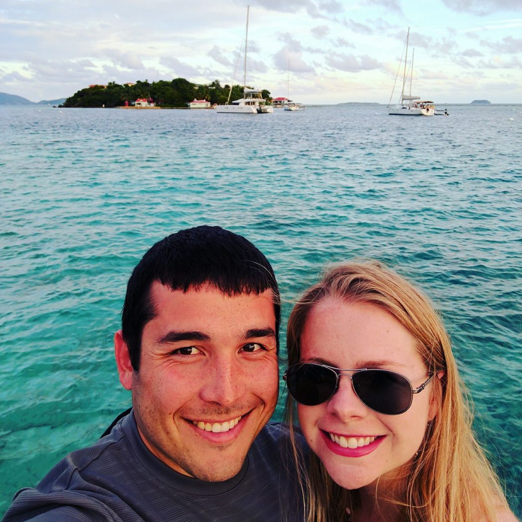 romance travel: couple selfie near the water