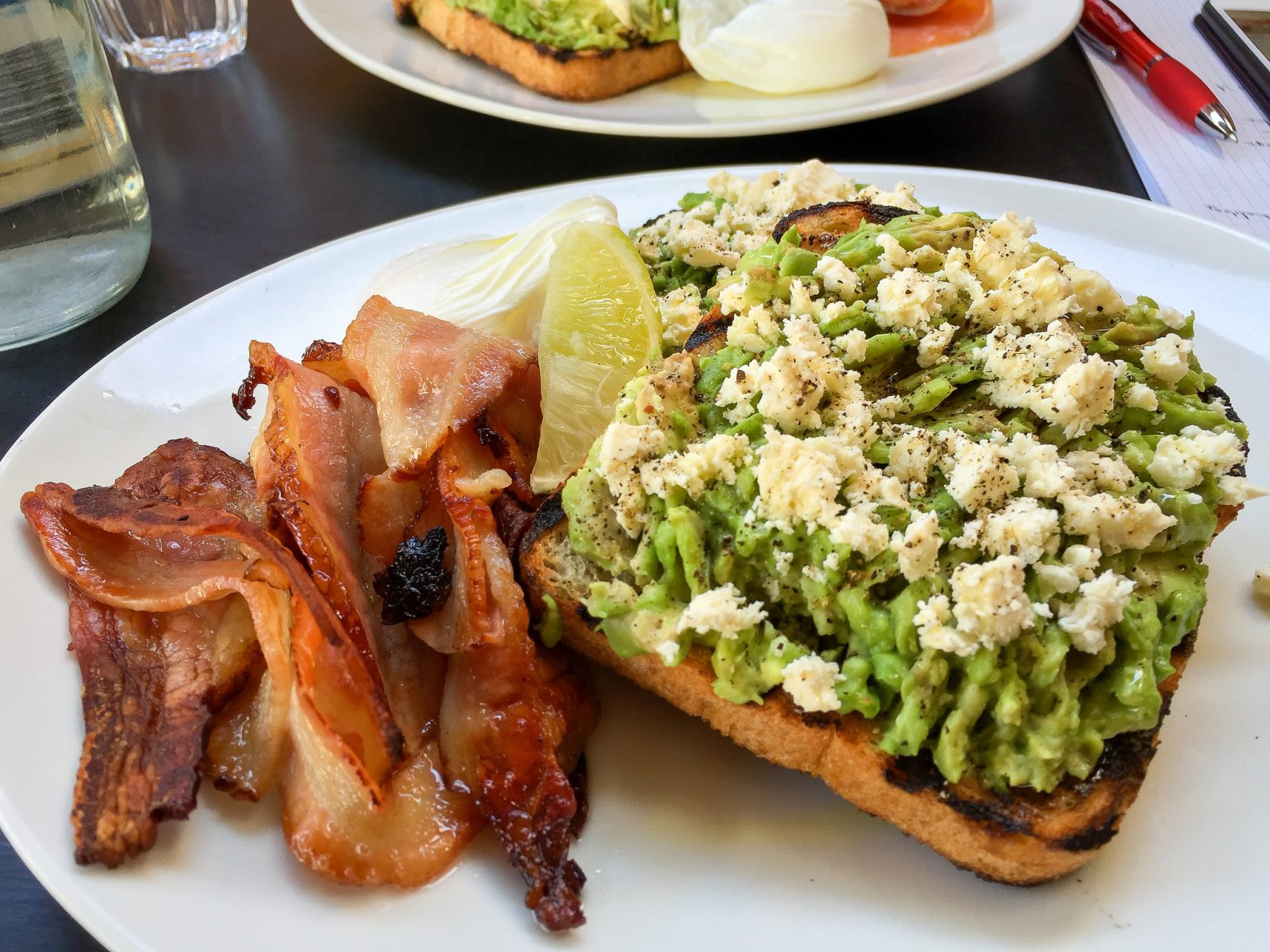 Smashed avocado on toast at Speakeasy in South Yarra. Photo by Katherine Lim via Flickr CC