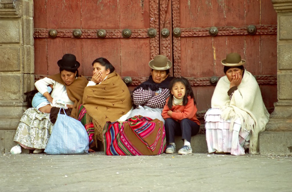 Women and children around the Cathedral dressed in traditional clothes. La Paz, Bolivia. Photo by Dennis Jarvis via Flickr CC