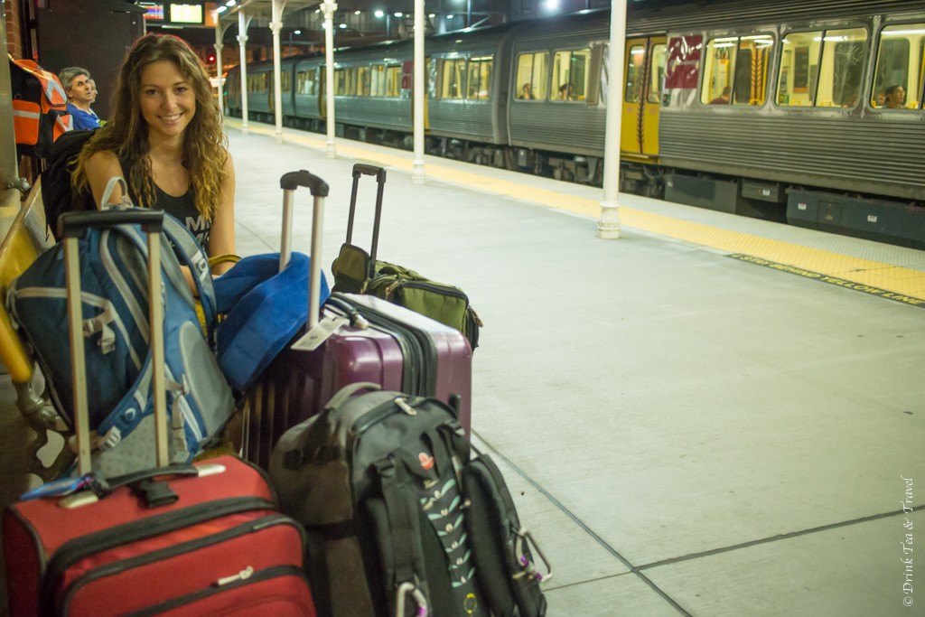 Oksana with bags at train station. Gold Coast. Queensland. Australia