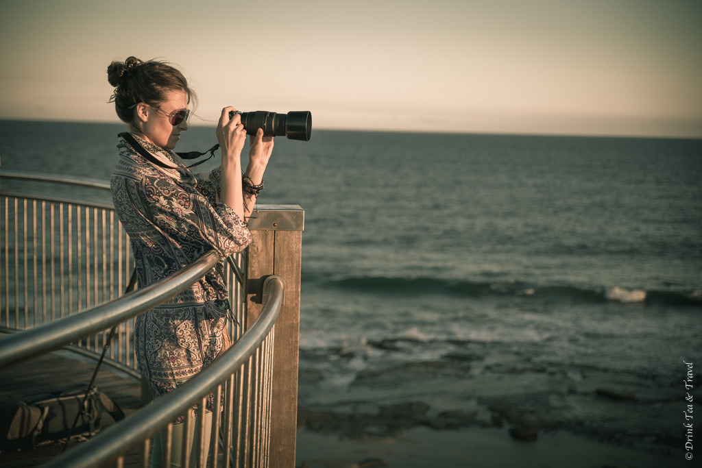 Oksana with camera in Newcastle. Australia