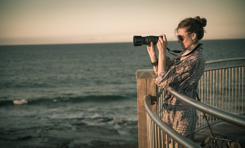 Oksana with camera in Newcastle. Australia