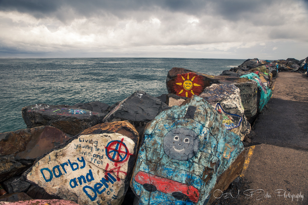 Rock paintings at breakwall, Port Macquarie, NSW