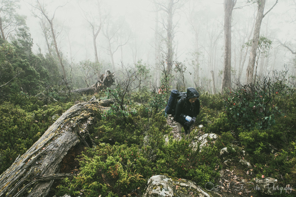 best places to visit in tasmania: Rainy wet day at Walls of Jerusalem. I feel just as miserable as I look