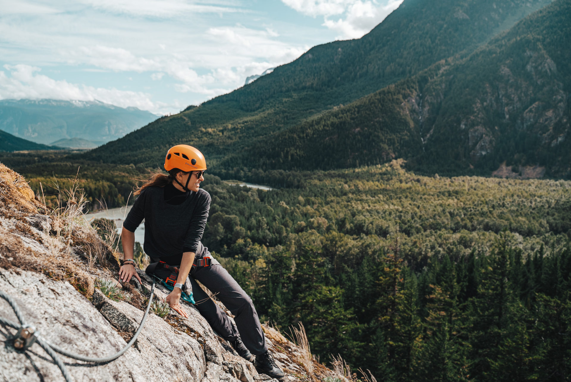 Oksana with her mountain climbing clothes