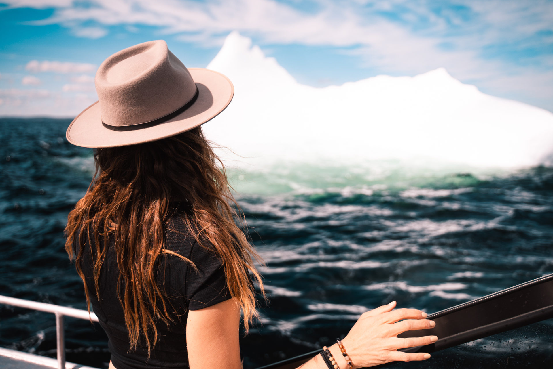 Admiring an iceberg in Newfoundland on our visit in June