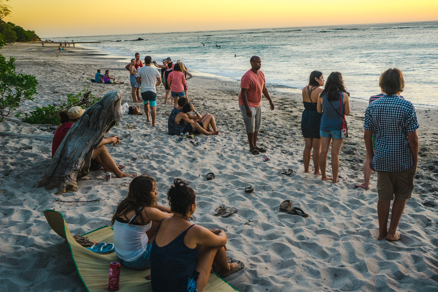 Watching sunset on the beach with our friends the day after our wedding 