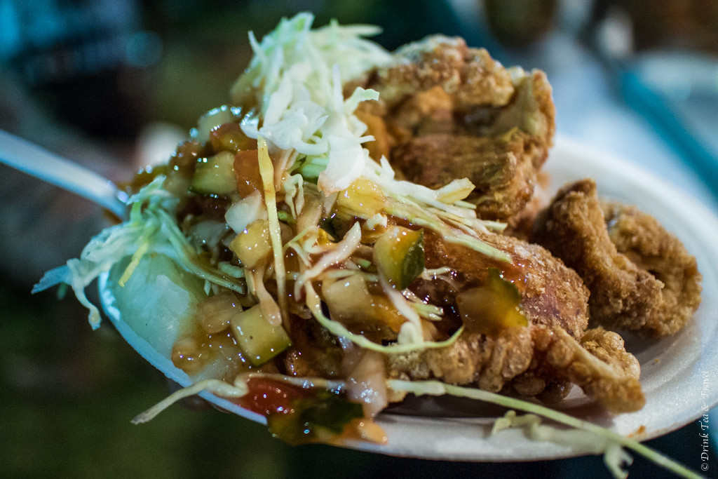 Popular Costa Rican food: Plate of chicharrones served with salad and salsa.