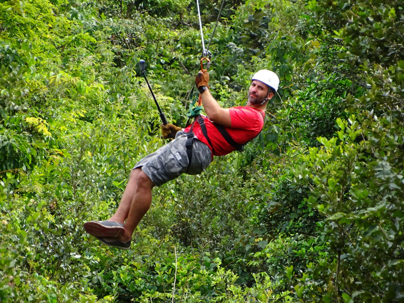 Zip lining thru Guachipelin before visiting Hot Springs in Costa Rica