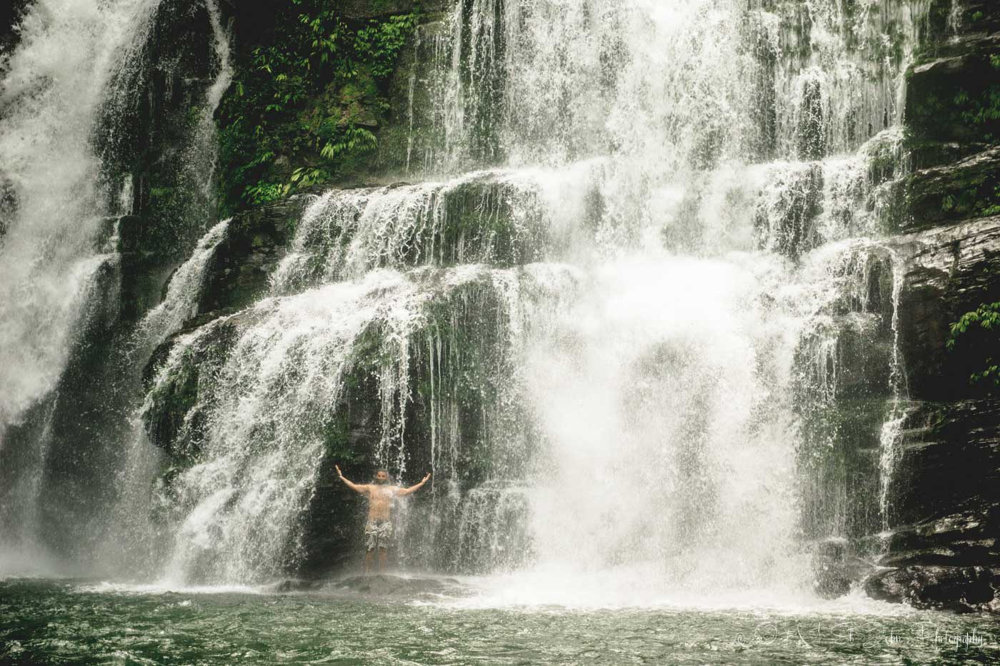 Max enjoying the chilly morning waters at the Nauyaca Falls