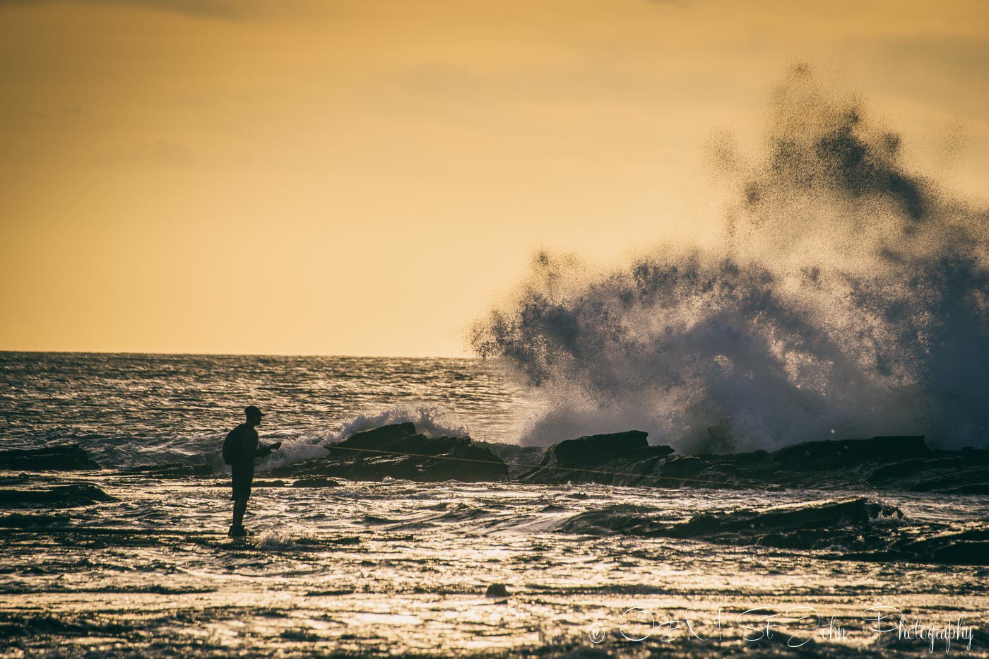 Local man fishing on Playa Pelada. Nosara. Costa Rica