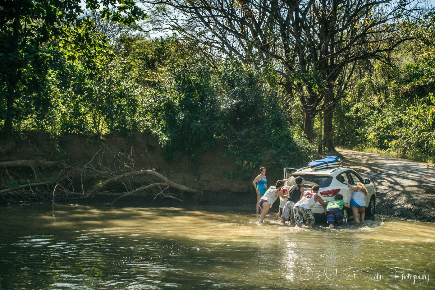 Car stuck in a river in Costa Rica