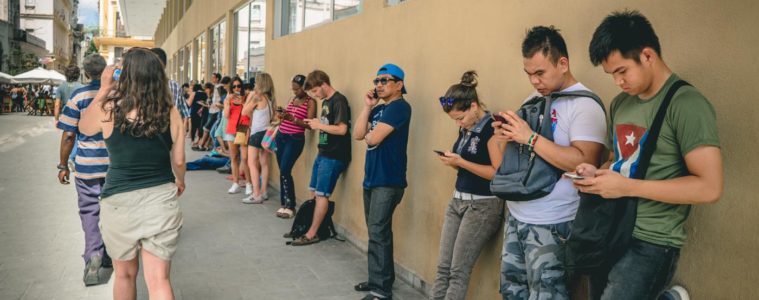 Internet in Cuba: Locals and visitors accessing the internet in Havana, Cuba