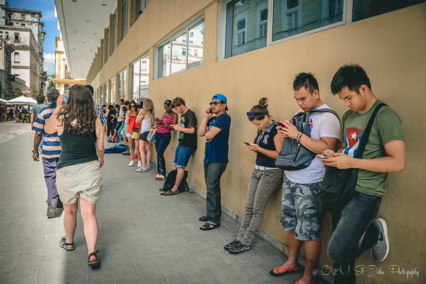 Internet in Cuba: Locals and visitors accessing the internet in Havana, Cuba
