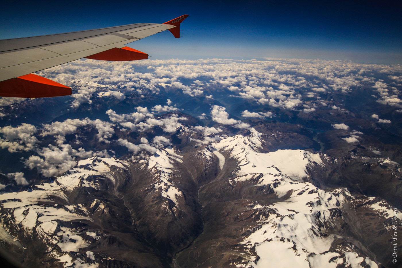 Flight over Swiss Alps. Europe.