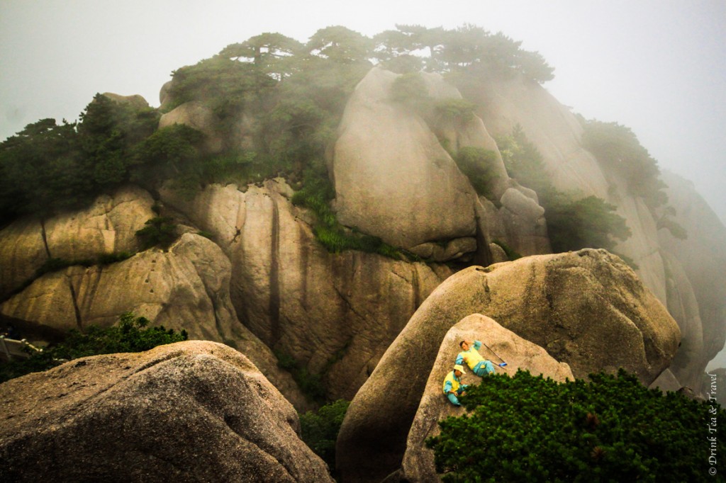 Maintenance workers hanging out on top of the rocks at Huangshan