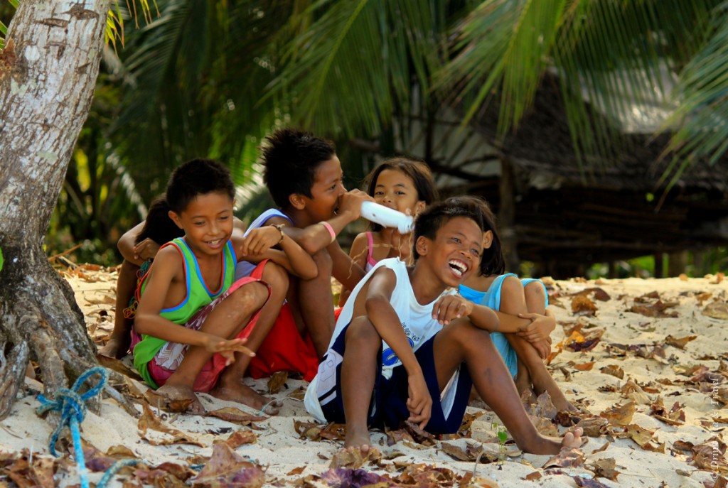 Kids enjoying life on a small island in Palawan, Philippines