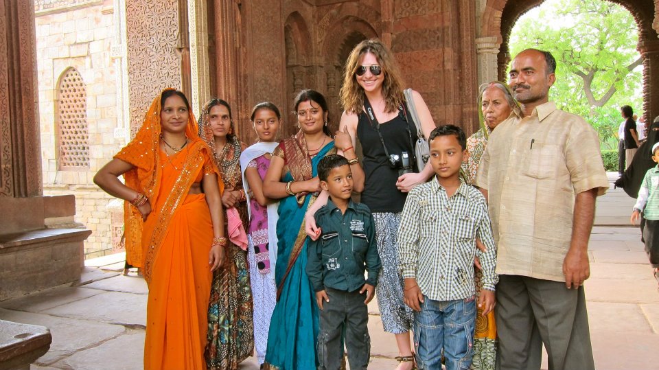 Posing for a photo with an Indian family
