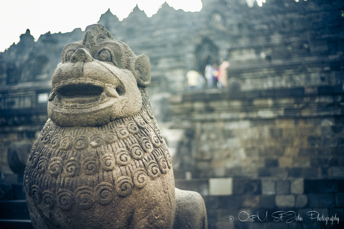 Statues at the entrance to Borobudur. Indonesia