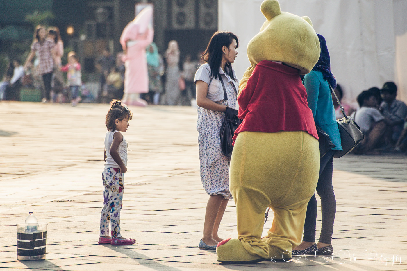 Winnie the Pooh chatting away with the locals in Taman Fatahilah, Old Jakarta 