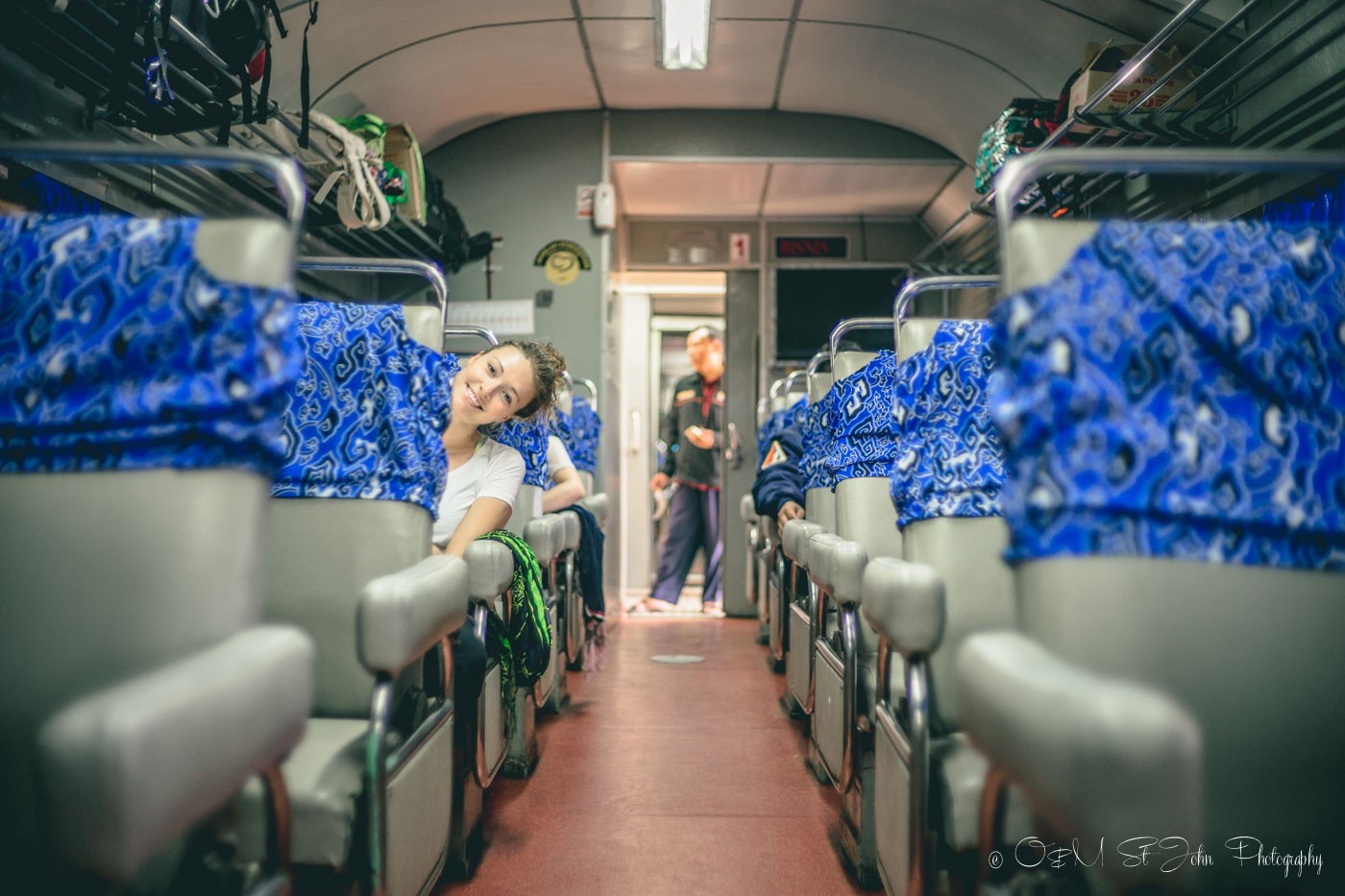 Oksana on the train in Indonesia