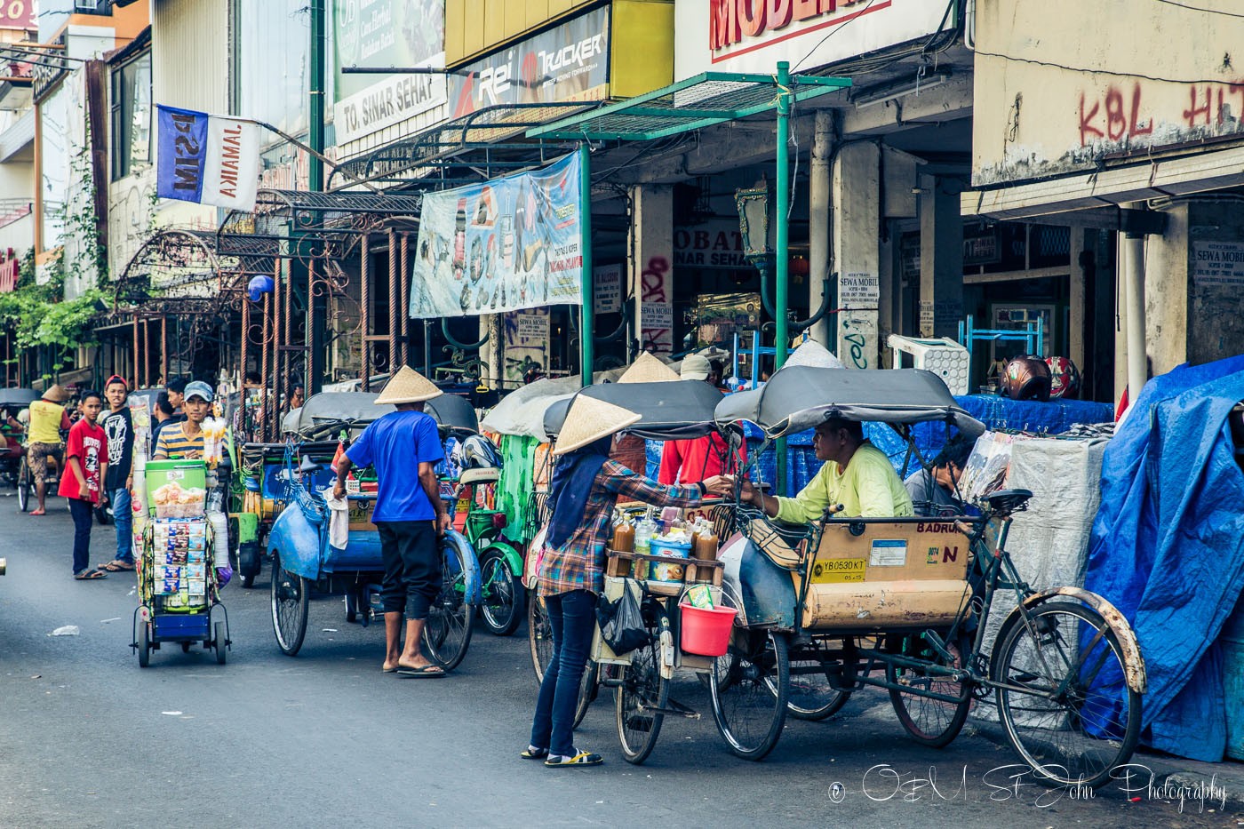 Rows of becaks on Jalan Malioboro. Yogyakarta. Java. Indonesia