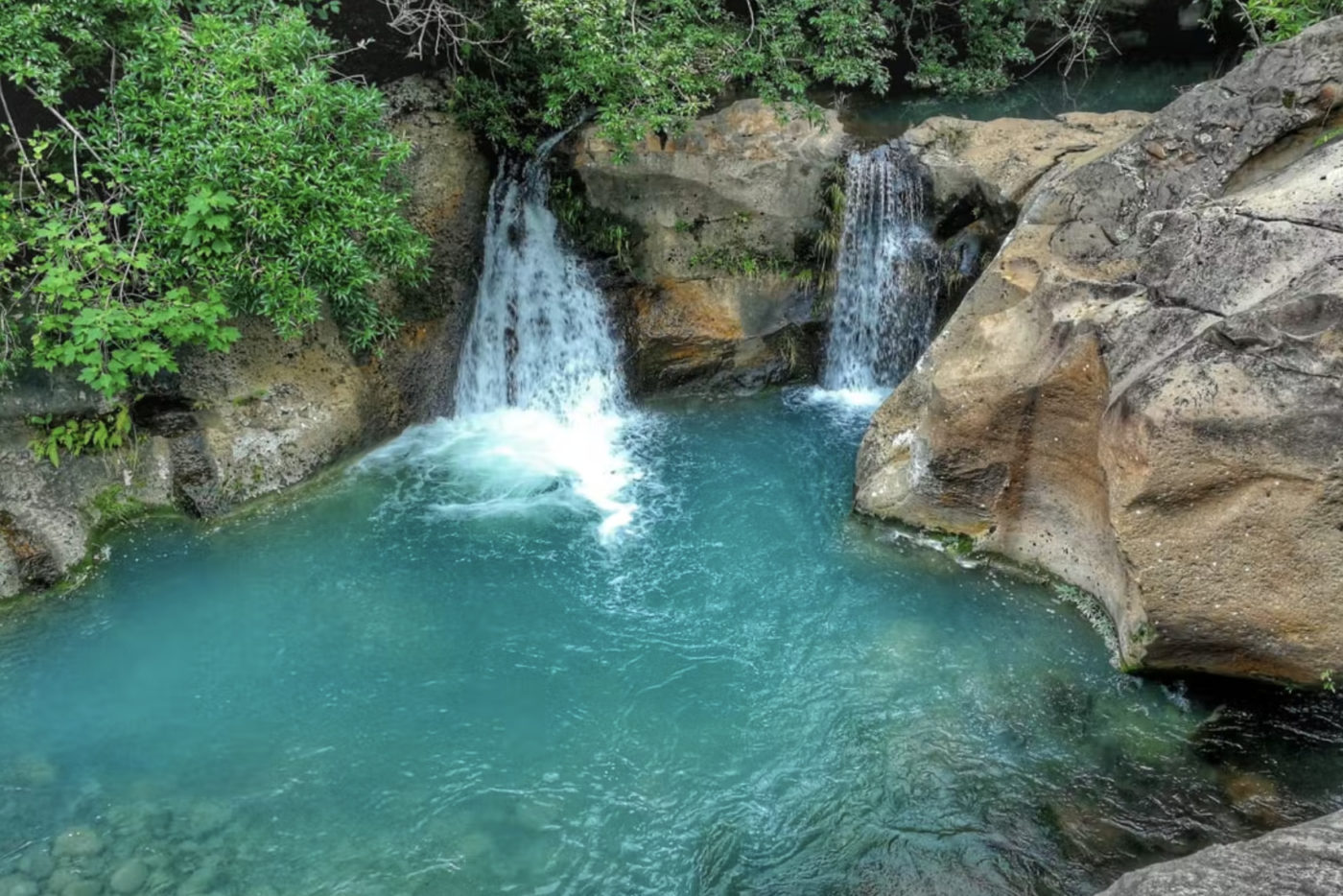 Las Chorreras Waterfall. Photo via Hotel Hacienda Guachipelin