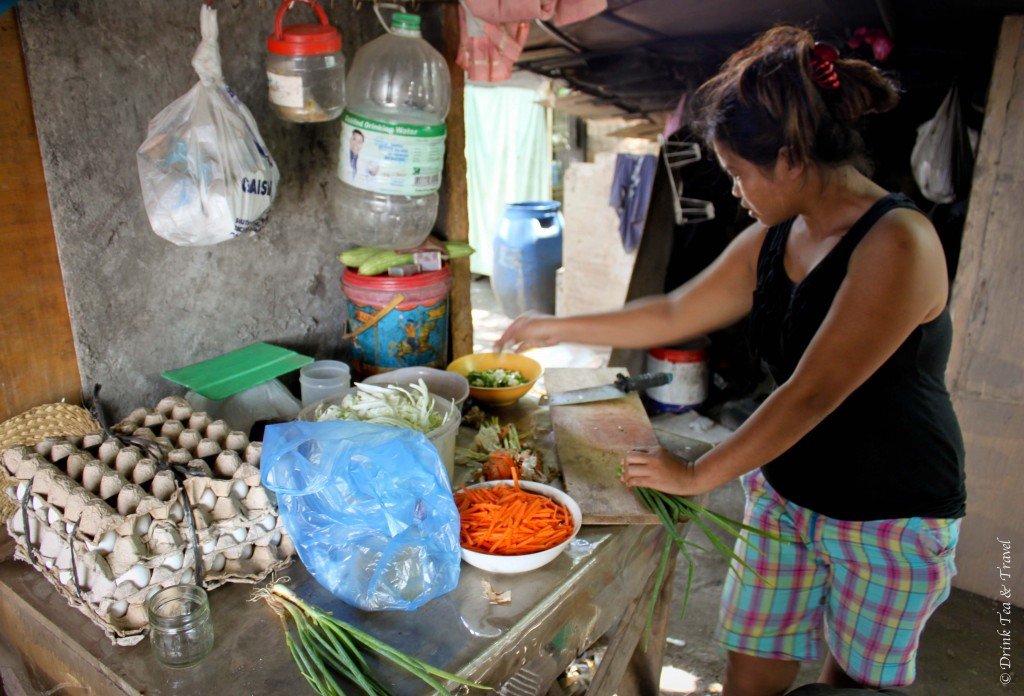 Cooking lunch at a dumpsite in Liloan, Cebu, Phlippines