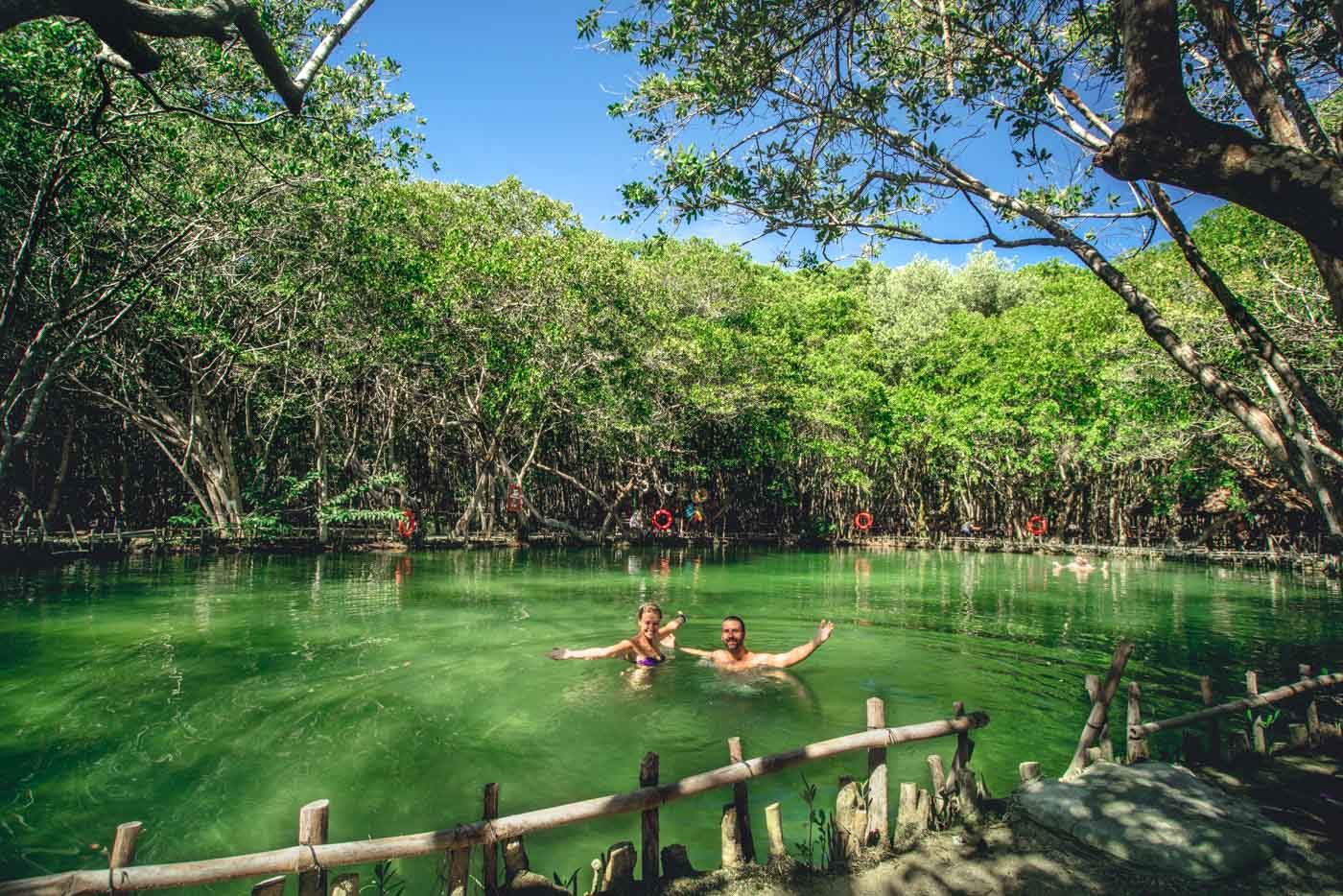 Swimming in a cenote near Progreso, Yucatan, Mexico