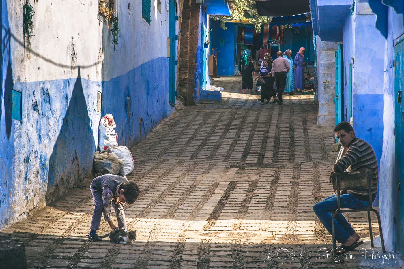 Chefchaouen is full of cats and kids. Morocco