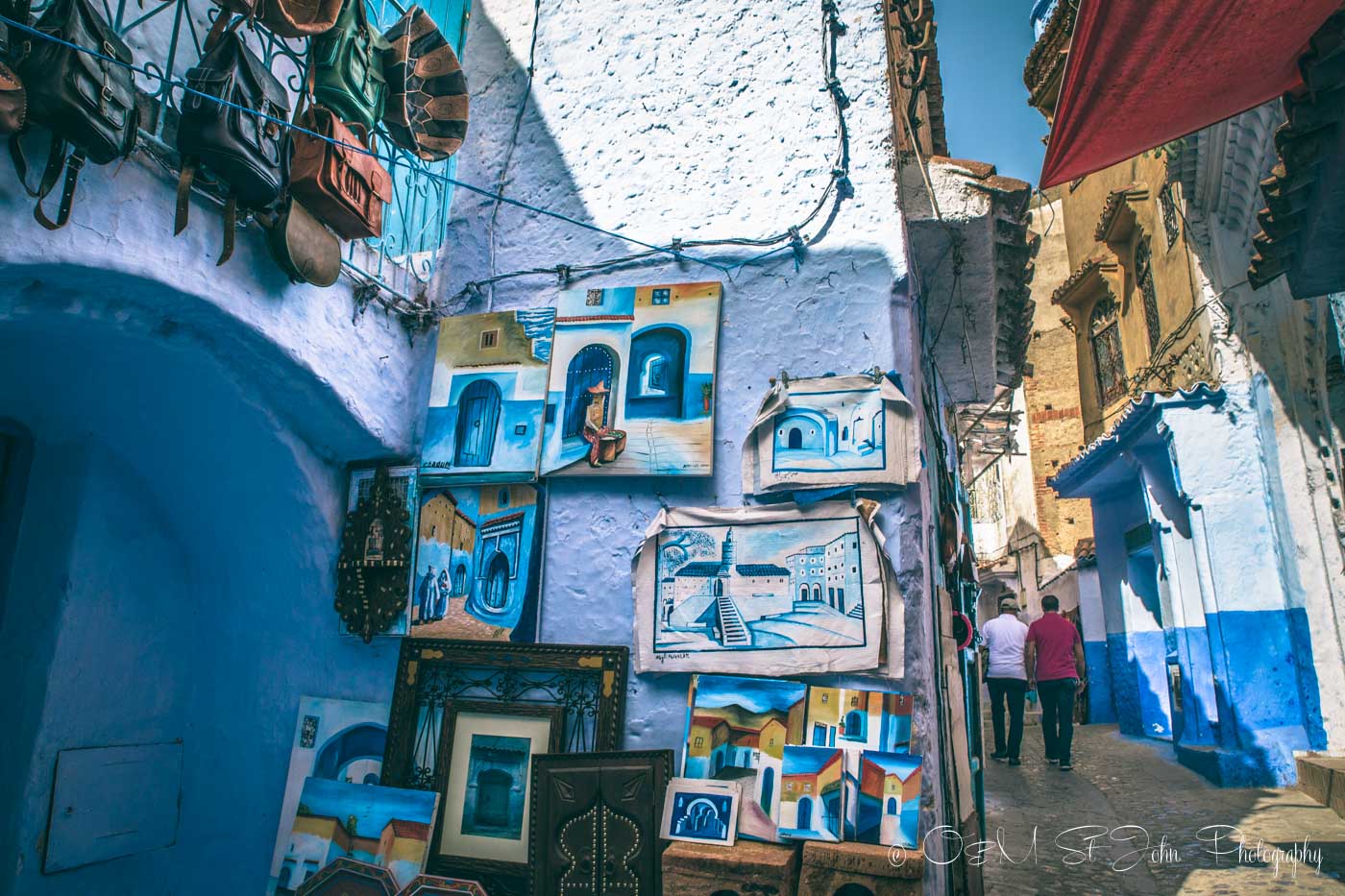 Paintings of Chefchaouen sold in the alleyways of Chefchaouen. 