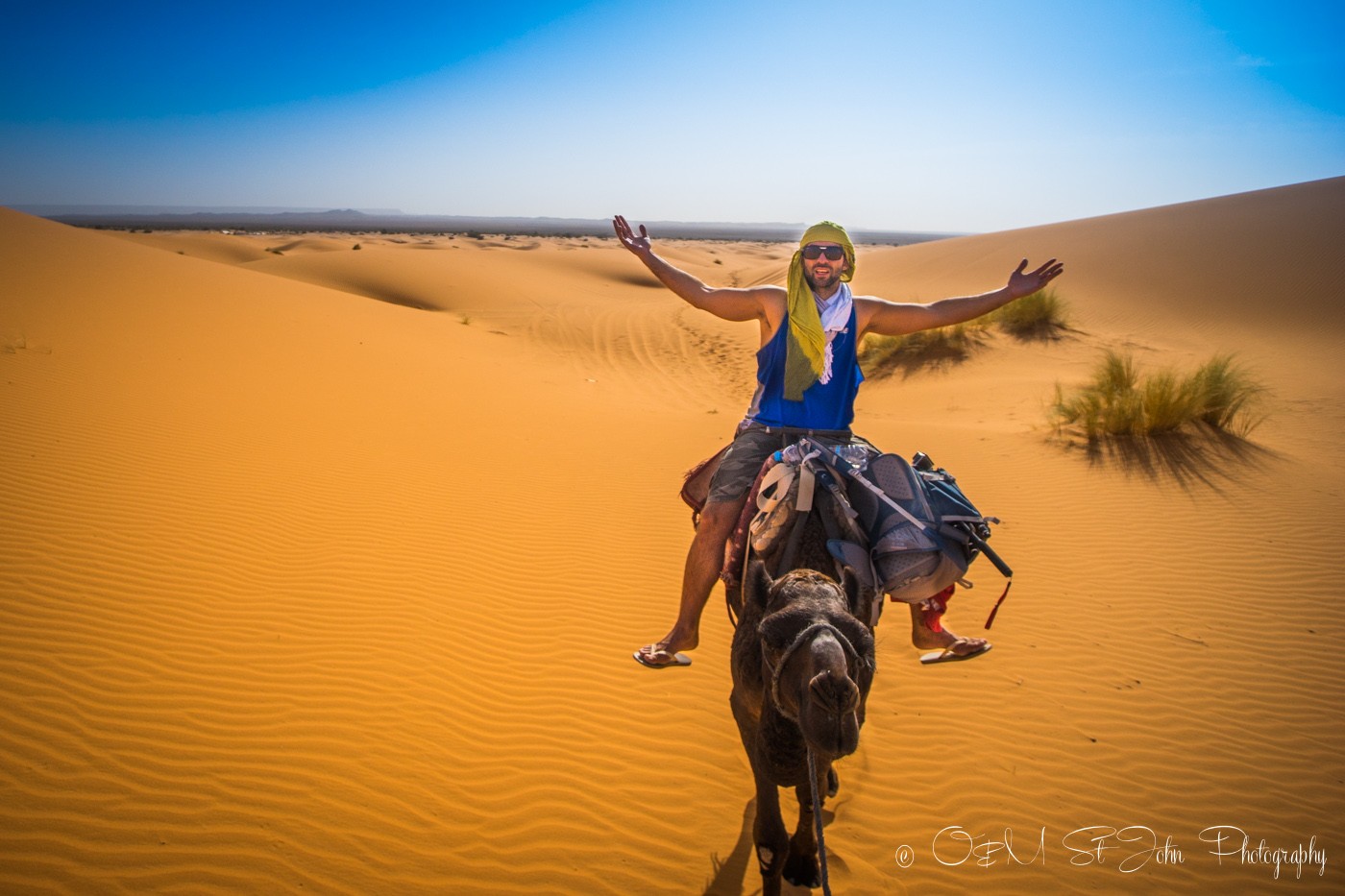 Max loving life on the camel. Erg Chebbi. Sahara Desert. Morocco