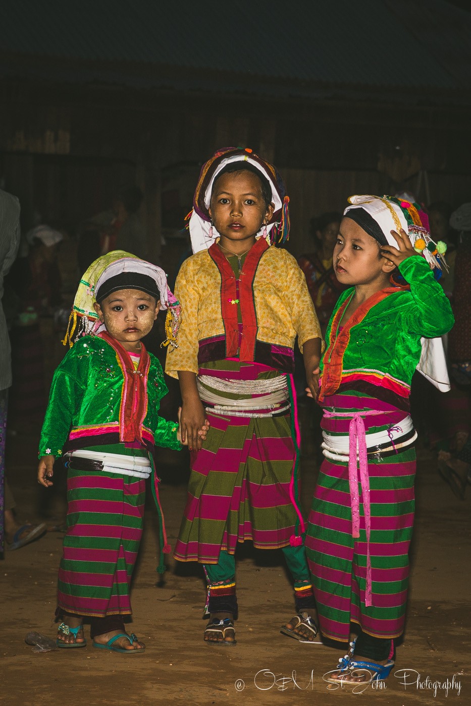 Young girls in traditional outfits at the Palaung VIillage Monk Harvest Festival. Myanmar