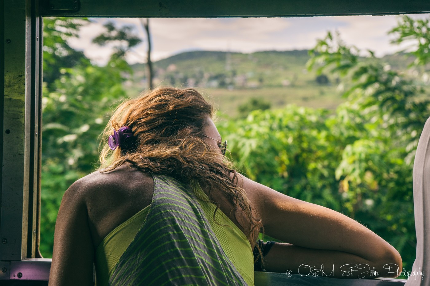 Oksana looking out the windon on train to Hsipaw. Myanmar