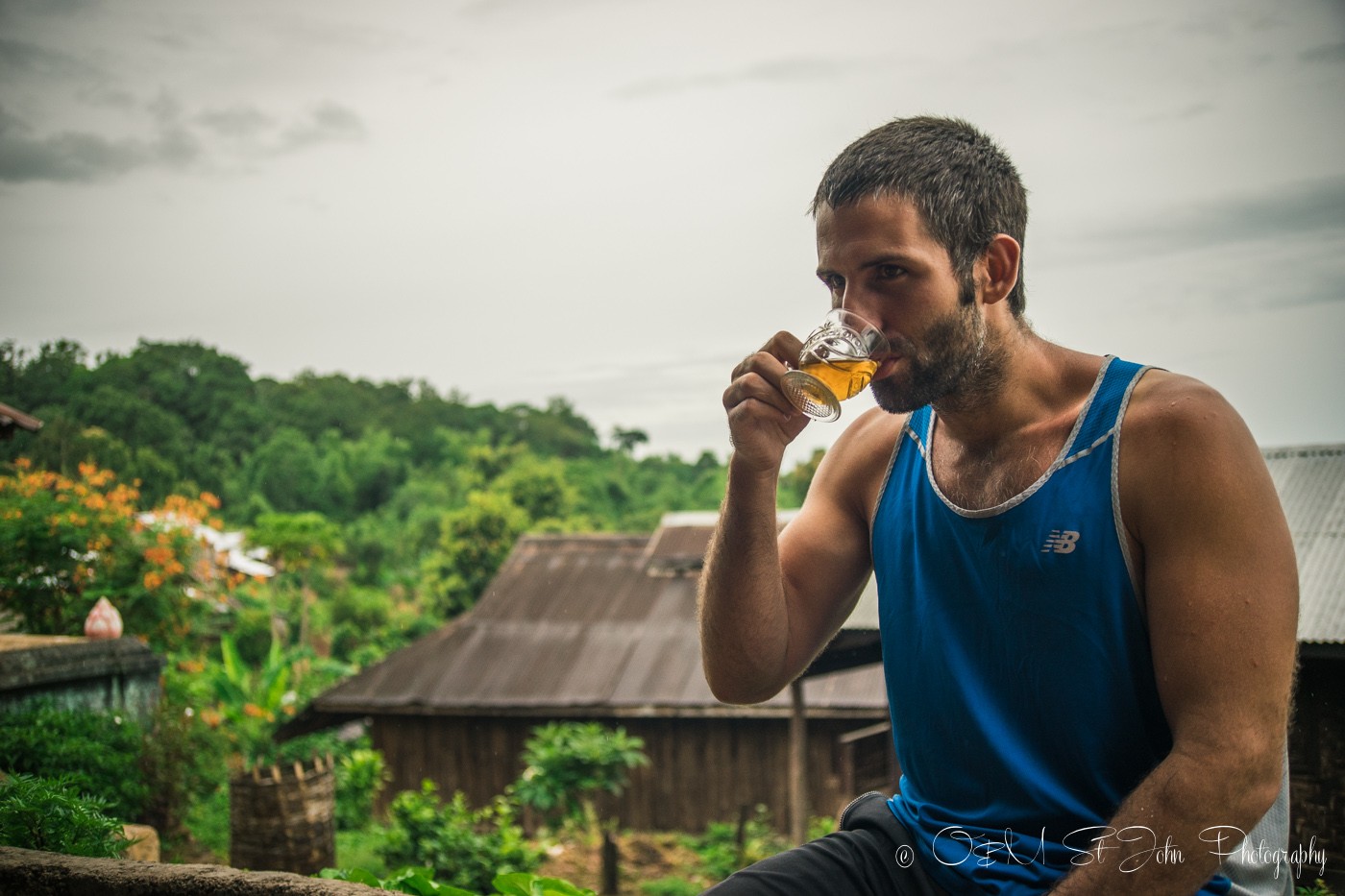 Max drinking tea in Palaung village. Myanmar
