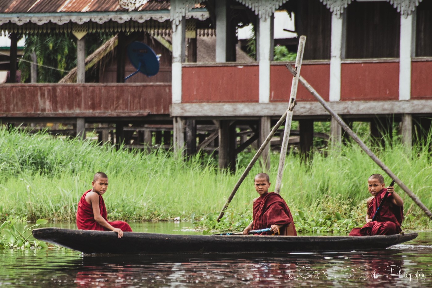 Young monks sailing on Inle Lake. Myanmar