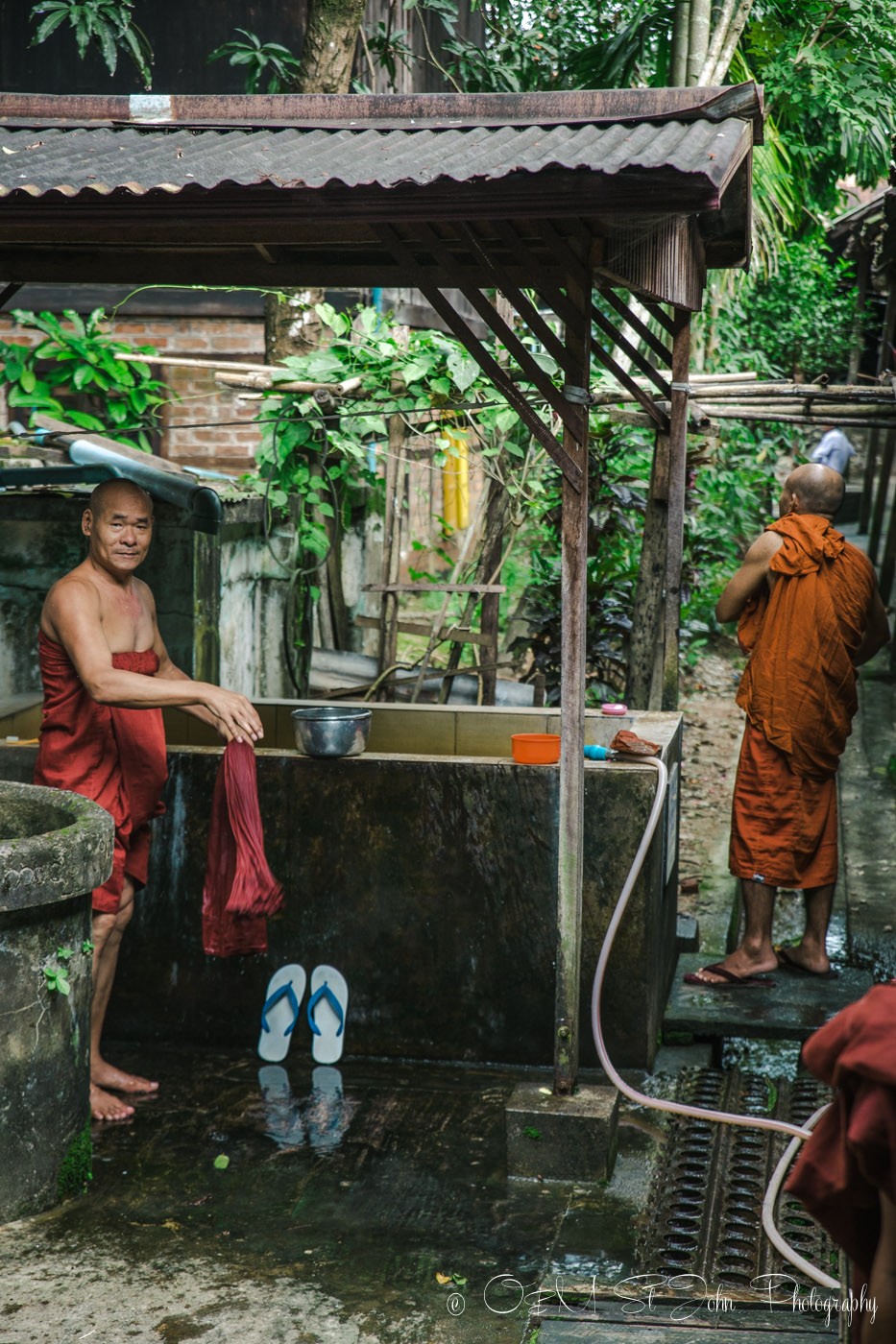 3 days in Yangon: Monks showering at the monastery. Yangon, Myanmar