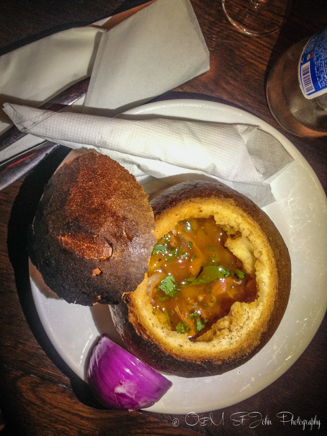 Bean an ham soup in bread, Romania