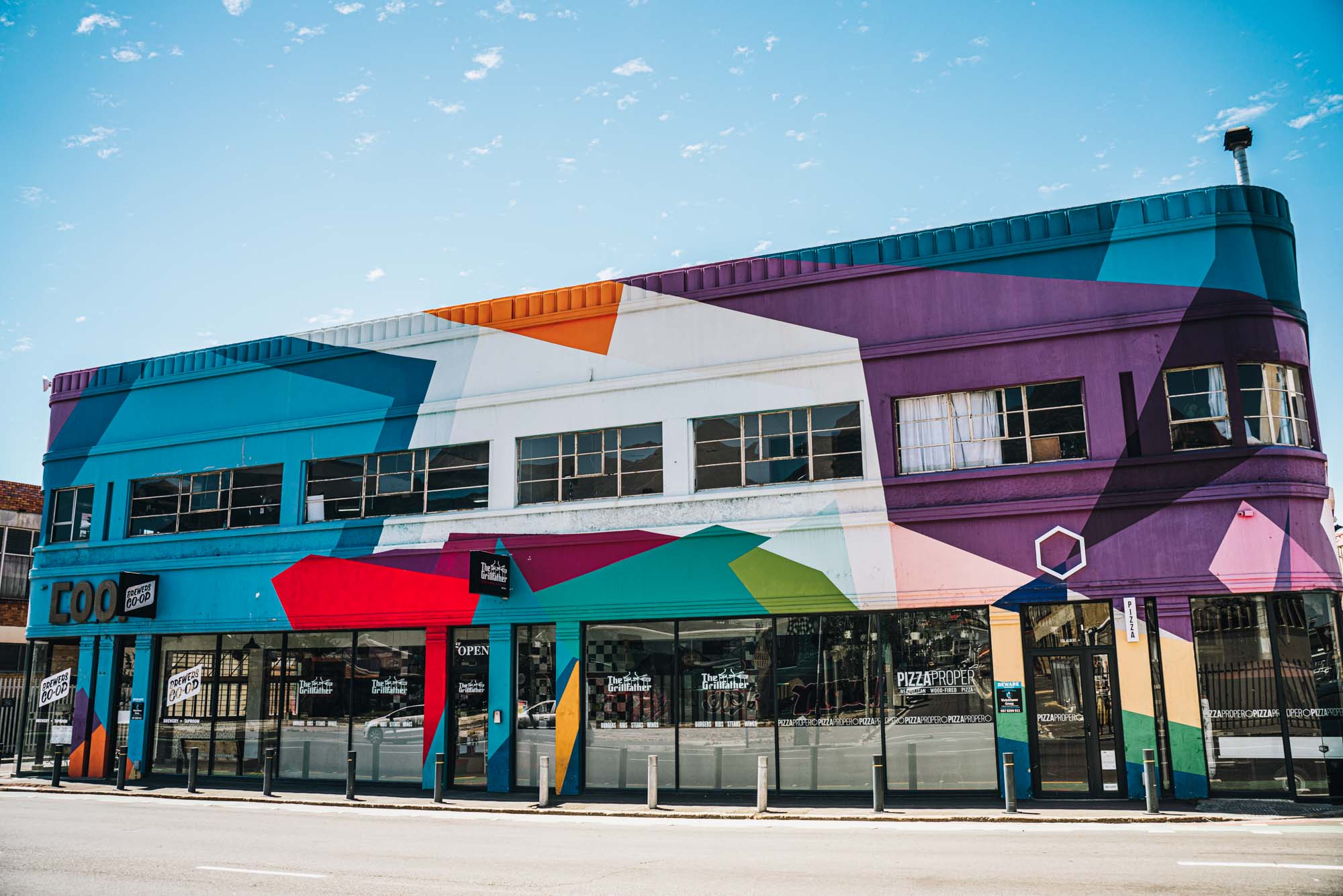 One of the many graffiti coloured buildings in Woodstock, Cape Town