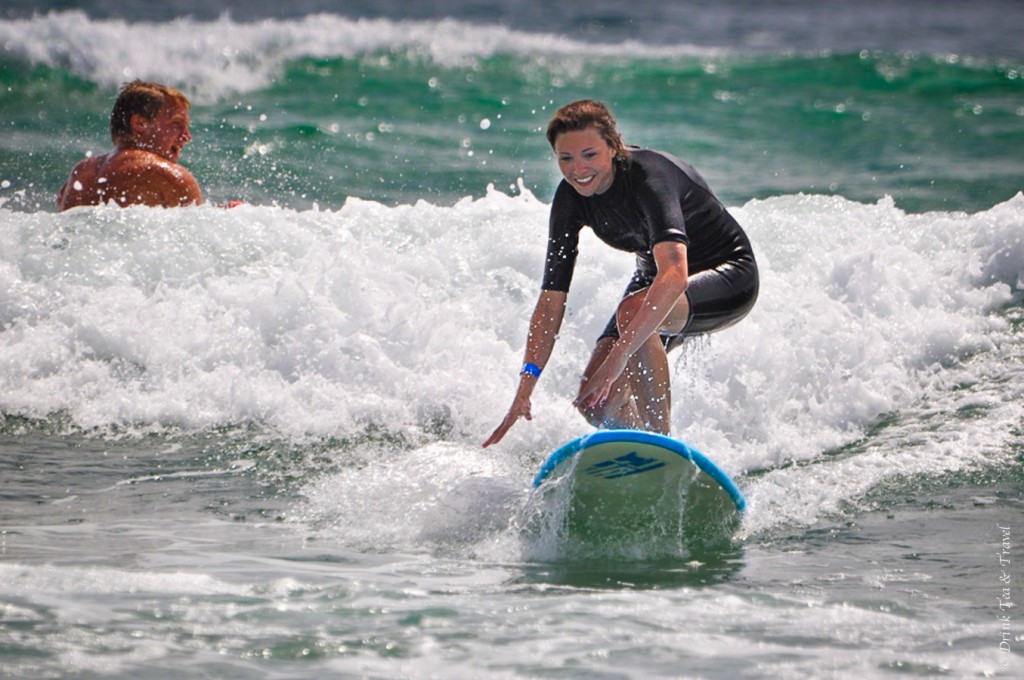 Catching my first wave at a surf camp in Australia