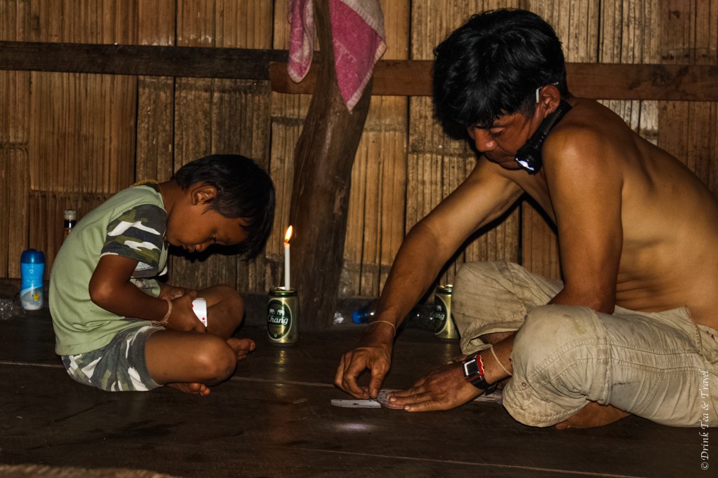 Father and son enjoying a game of cards