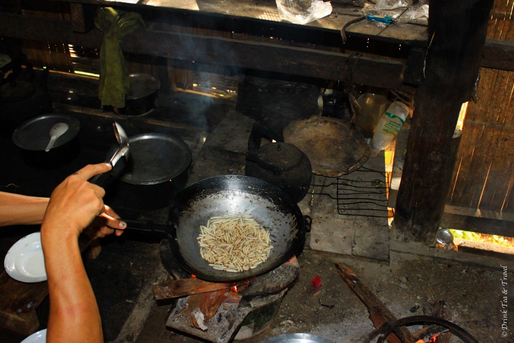 Bamboo worms being fried in oil