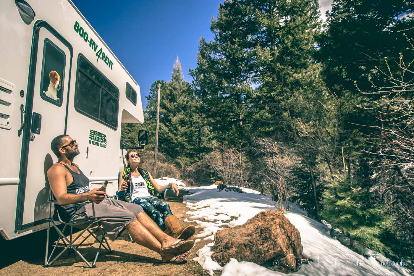 Max & Oksana having lunch near camper van in Colorado. USA Road trip