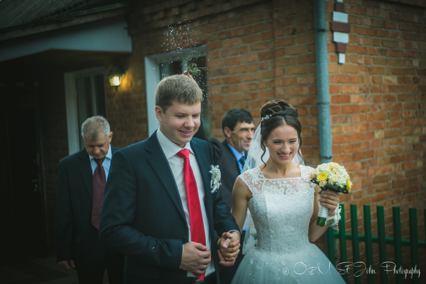 My cousin (groom) leaving the house with his bride. Ukraine Wedding Tradition