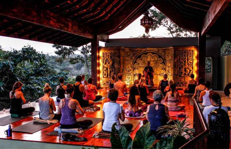 Yoga Retreats in Costa Rica: People practicing yoga at Anamaya Retreat