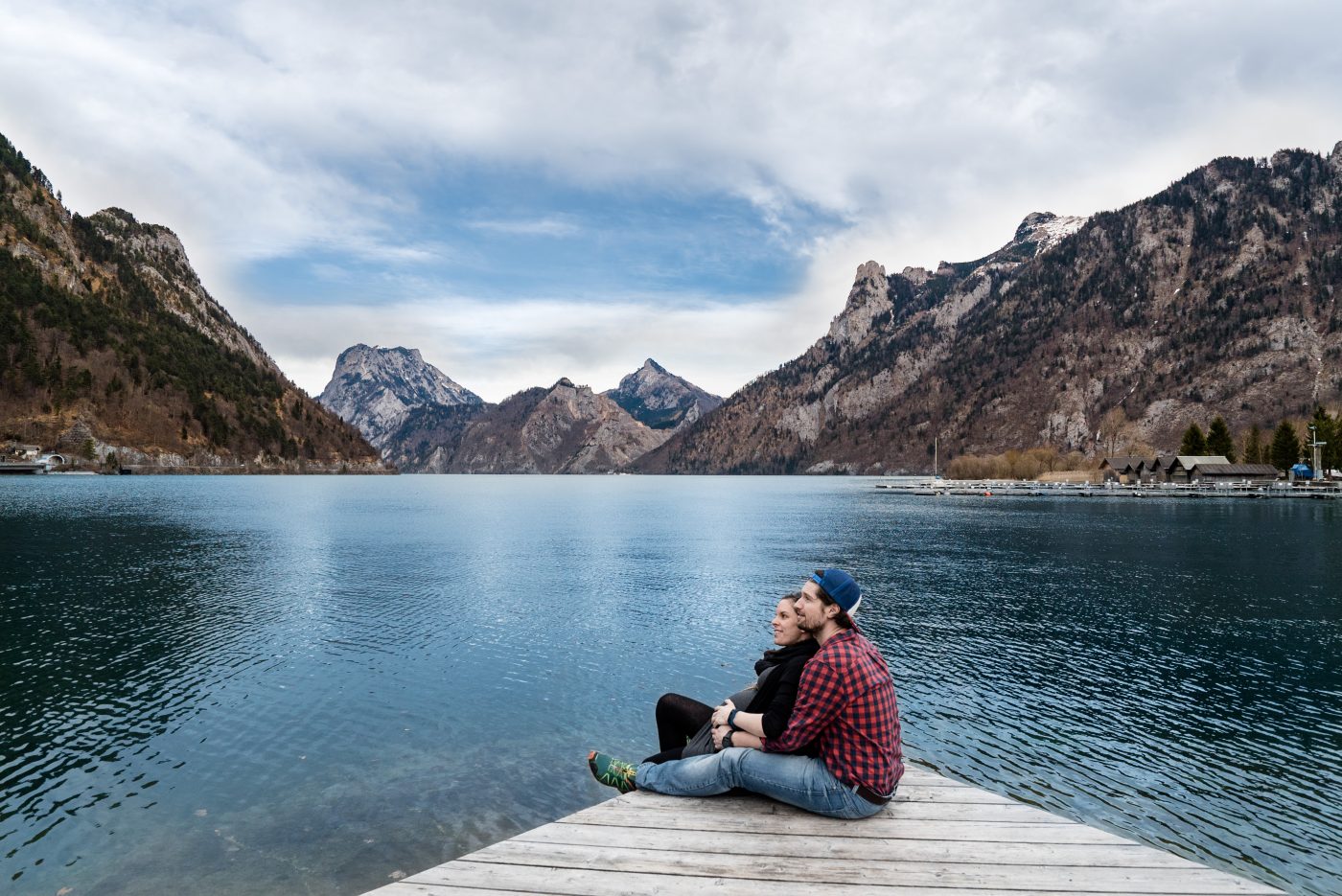 romance travel: sitting on a dock of the lake