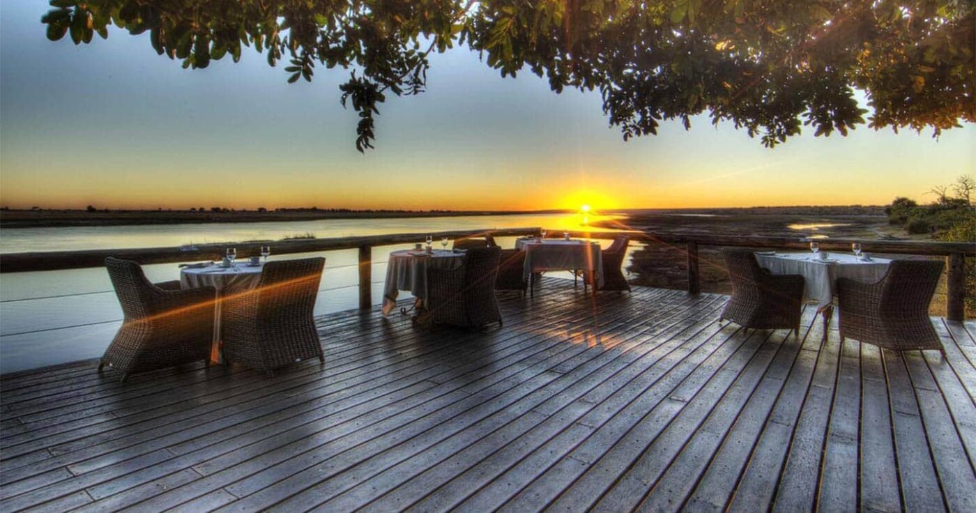 romantic botswana safari chobe game lodge sunset dinner